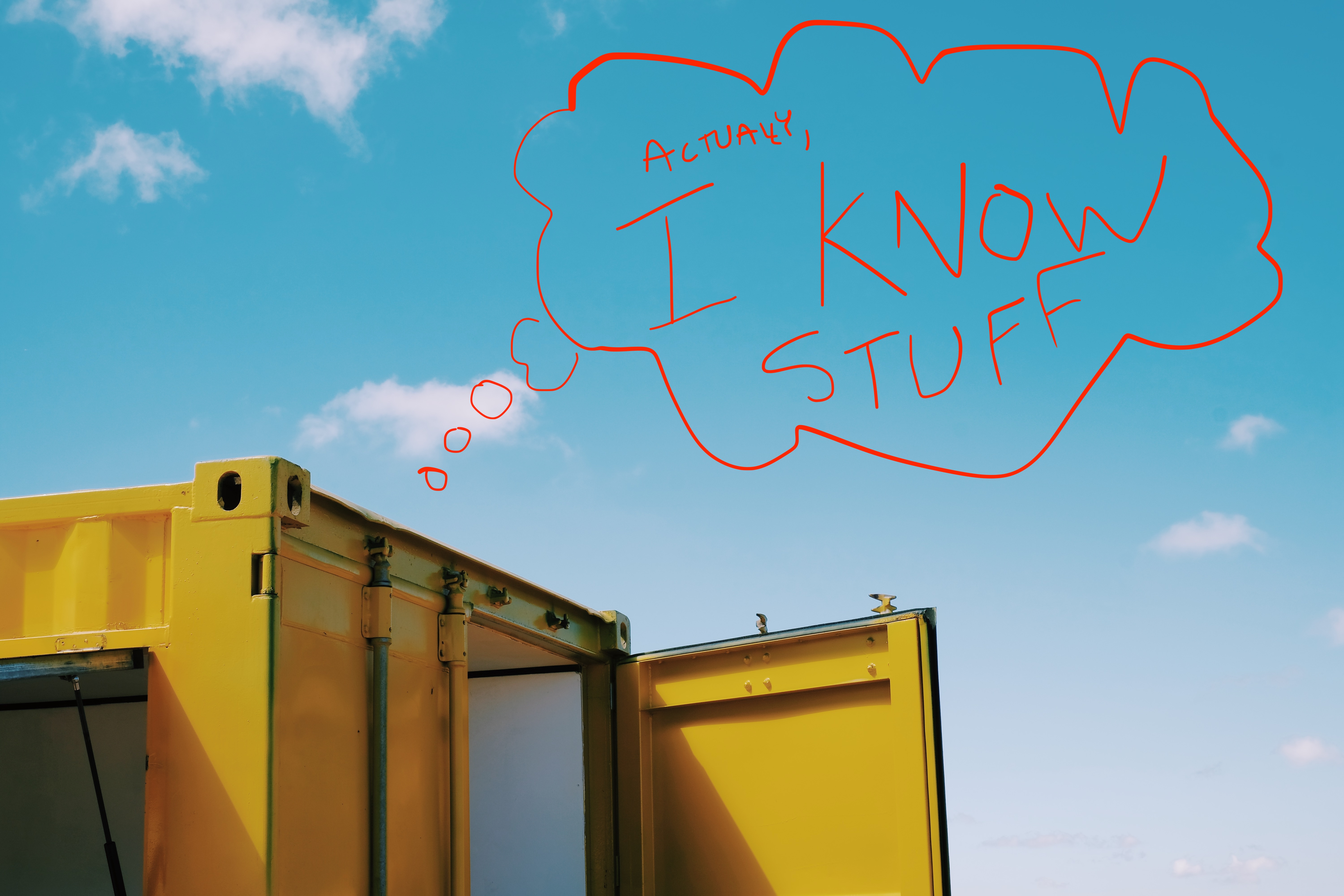 Yellow shipping container
with a red hand-written speech bubble:
actually, I know stuff
