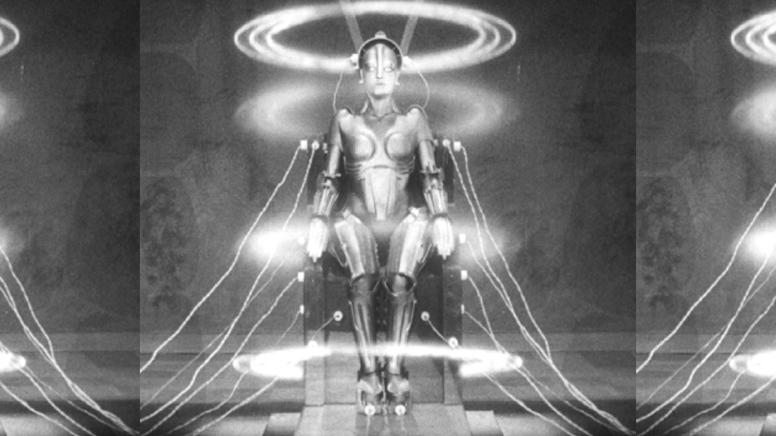 Mammon,
the android from Metropolis,
in a chair
with wires feeding into her head

